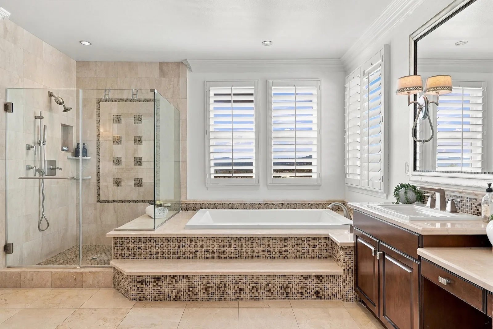 Primary bath with soaking tub and glass shower